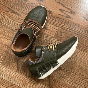 Esseutesse’s Leather Fringe Sneakers